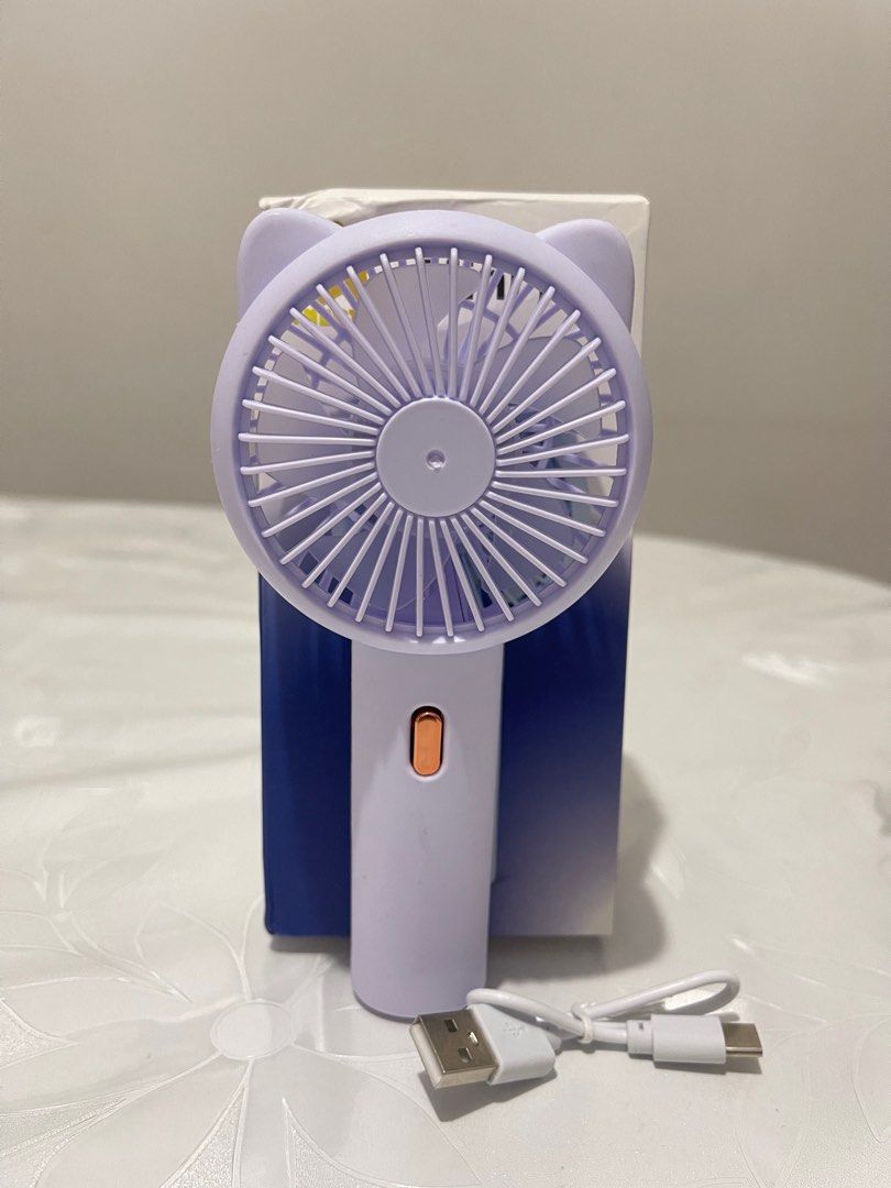 Portable Cute Fan / Handheld Purple Fan (Category: Other Gadgets) located in Las Pinas. Submitted by nsp2014264 (Listing ID 1423187213, Image 3). Description: Portable fan / Mini Handheld fan.