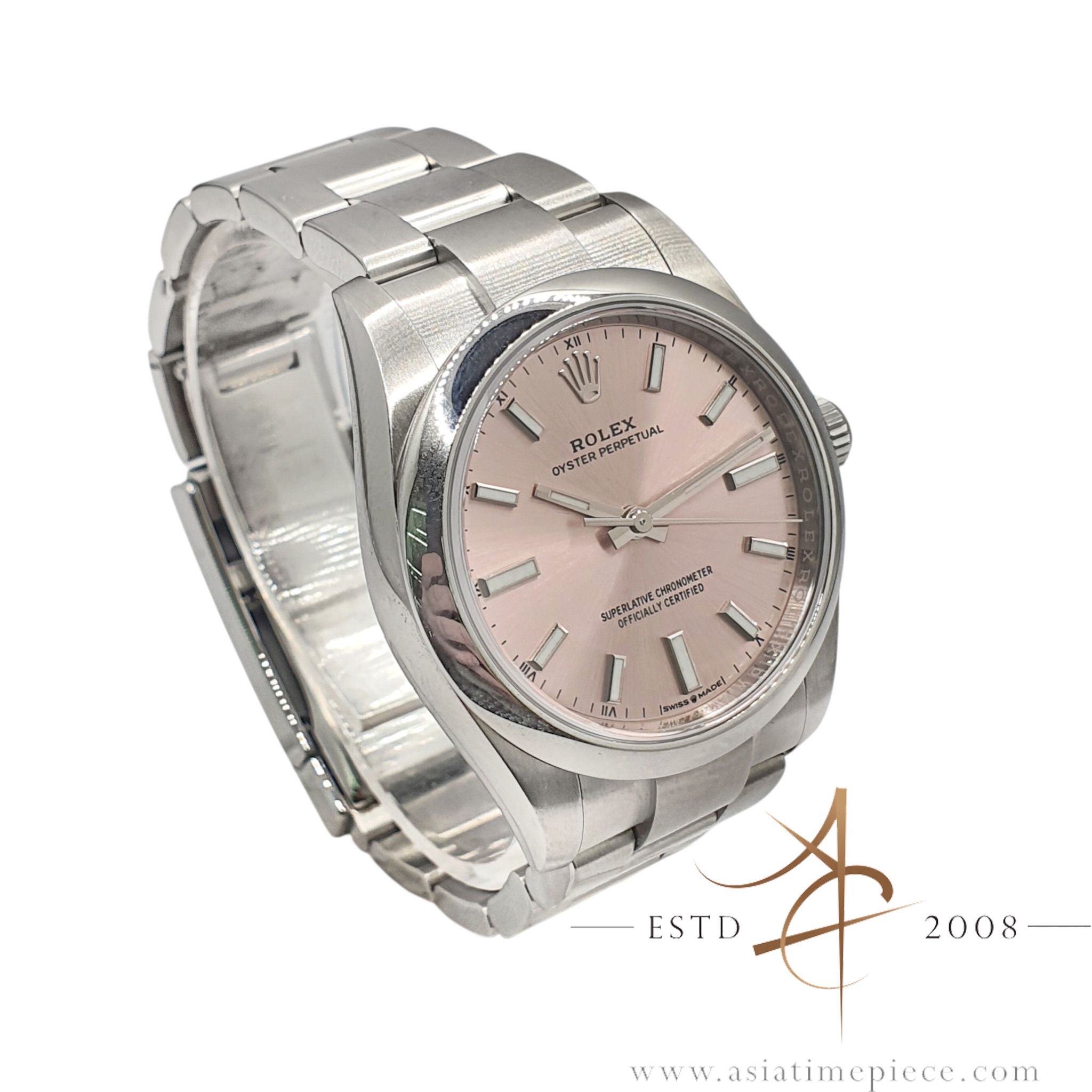 Rolex Oyster Perpetual 34 Sunray Pink Oystersteel Certified Pre Owned Set (Category: Watches) located in Singapore. Submitted by asiatimepiece (Listing ID 1423142431, Image 2). Description: Rolex Oyster Perpetual 34 Sunray Pink (discontinued colour) Remarks: The Rolex Oyster Perpetual 34 (Ref. 124200) Sunray Pink colour was officially discontinued in April 2025, it has become a top-tier target for enthusiasts who want a classic aesthetic that Rol