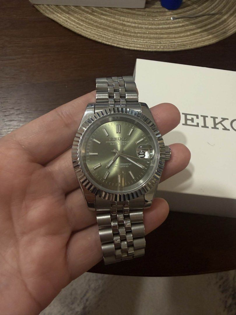 Seiko Oyster Perpetual Datejust Watch (Category: Luxury Watches) located in Marikina City. Submitted by jbisonpaz (Listing ID 1423204222, Image 3). Description: - Seiko Datejust watch - Silver stainless steel strap - Stunning green dial - Fluted bezel - Date display - Comes with box QC area.