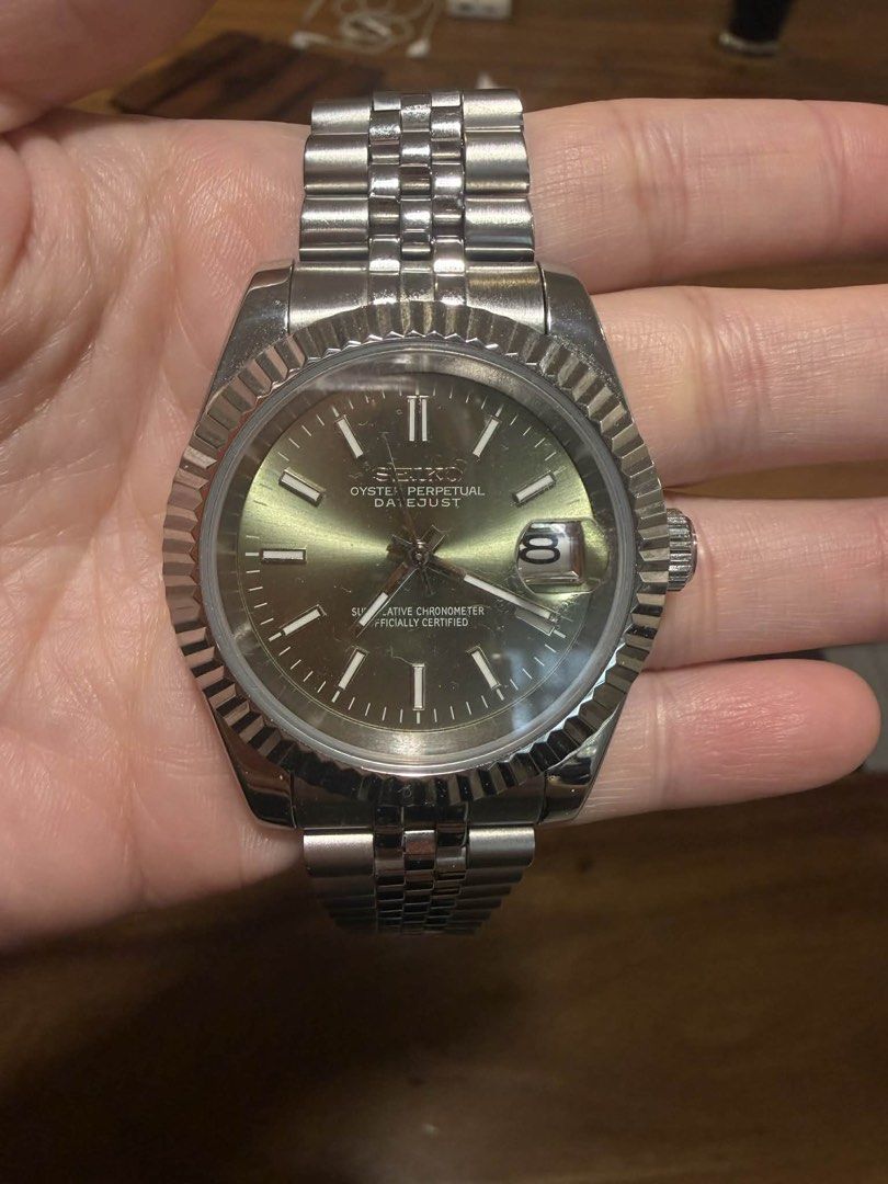 Seiko Oyster Perpetual Datejust Watch (Category: Luxury Watches) located in Marikina City. Submitted by jbisonpaz (Listing ID 1423204222, Image 2). Description: - Seiko Datejust watch - Silver stainless steel strap - Stunning green dial - Fluted bezel - Date display - Comes with box QC area.