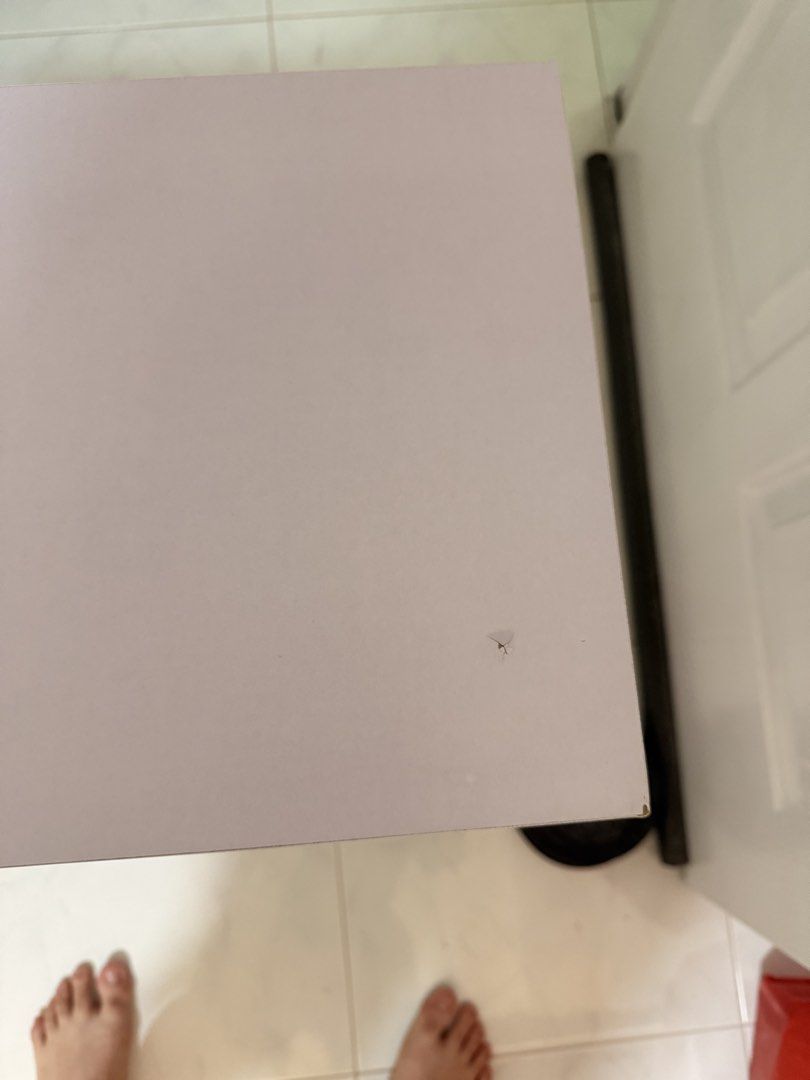 Small study desk (Category: Tables & Sets) located in Singapore. Submitted by mrlooo (Listing ID 1423200039, Image 2). Description: - Suitable for small spaces - White tabletop and metal legs - Minor mark on tabletop - self collect - Dimensions: width: 60cm, depth: 28cm, height: 58cm.