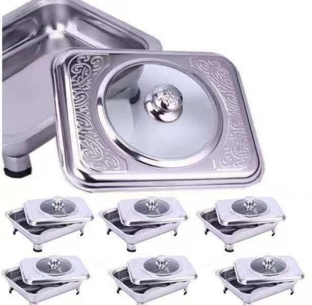 Stainless Steel Chafing Dish Set (Category: Other Kitchenware & Tableware) located in Manila. Submitted by lyfrancois14 (Listing ID 1423105546, Image 1). Description: - Complete chafing dish set, perfect for serving food at gatherings. - Includes 1 large and 6 smaller chafing dishes. - Constructed from durable stainless steel. - Features clear glass lids for easy viewing. - Elegant decorative accents..