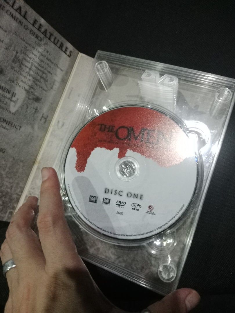 The Omen Ultimate Collector's Edition DVD (Category: CDs & DVDs) located in Davao. Submitted by suxrox (Listing ID 1423241046, Image 3). Description: - Omen Ultimate Collector's Edition DVD set. - Includes the original movie and its sequels. - Set contains four DVDs. - Features iconic box art. - Perfect for horror movie enthusiasts..