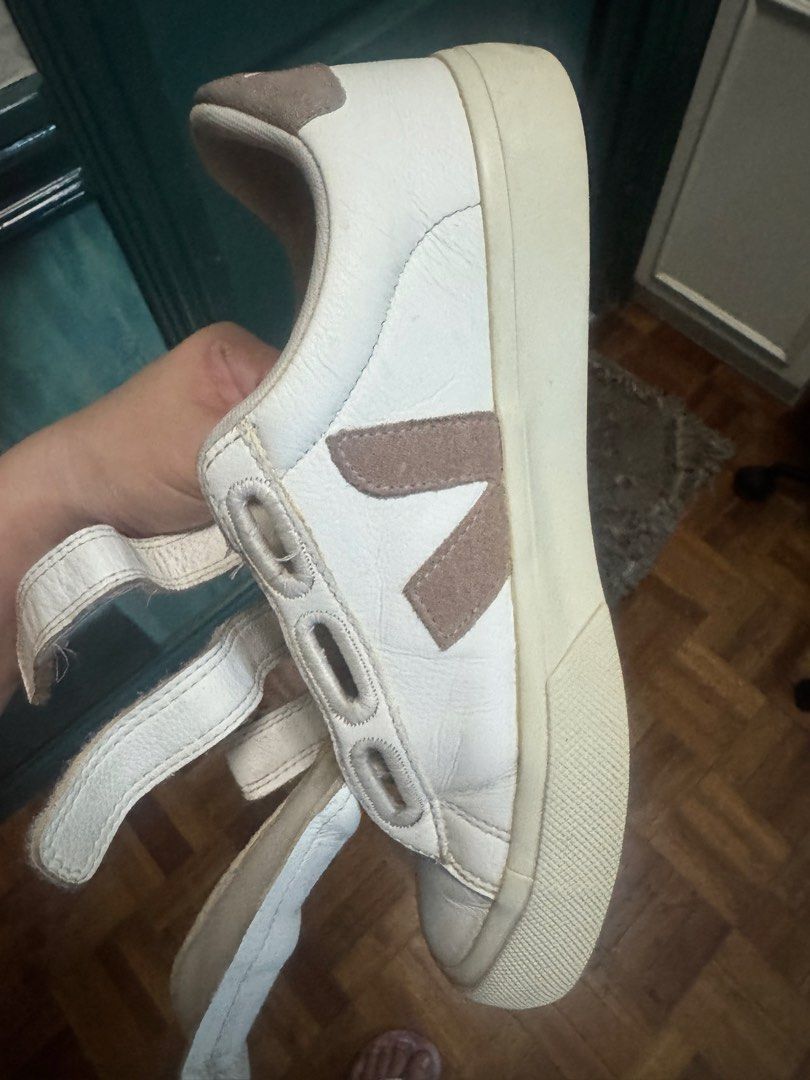 Veja Pink Beige Velcro Sneakers (Category: Sneakers) located in Manila. Submitted by d_minimalist (Listing ID 1423178159, Image 3). Description: - Veja velcro sneakers - White with beige sole and pink V logo - Size: EUR 38 / US 7 / UK 5 - Made in Brazil - Veja logo on the back - Easy to match with attire - Easy to wear because of its velcro type - Small scratches on sole barely noticeable RFS: want a different style.