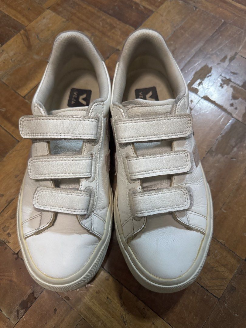 Veja Pink Beige Velcro Sneakers (Category: Sneakers) located in Manila. Submitted by d_minimalist (Listing ID 1423178159, Image 2). Description: - Veja velcro sneakers - White with beige sole and pink V logo - Size: EUR 38 / US 7 / UK 5 - Made in Brazil - Veja logo on the back - Easy to match with attire - Easy to wear because of its velcro type - Small scratches on sole barely noticeable RFS: want a different style.