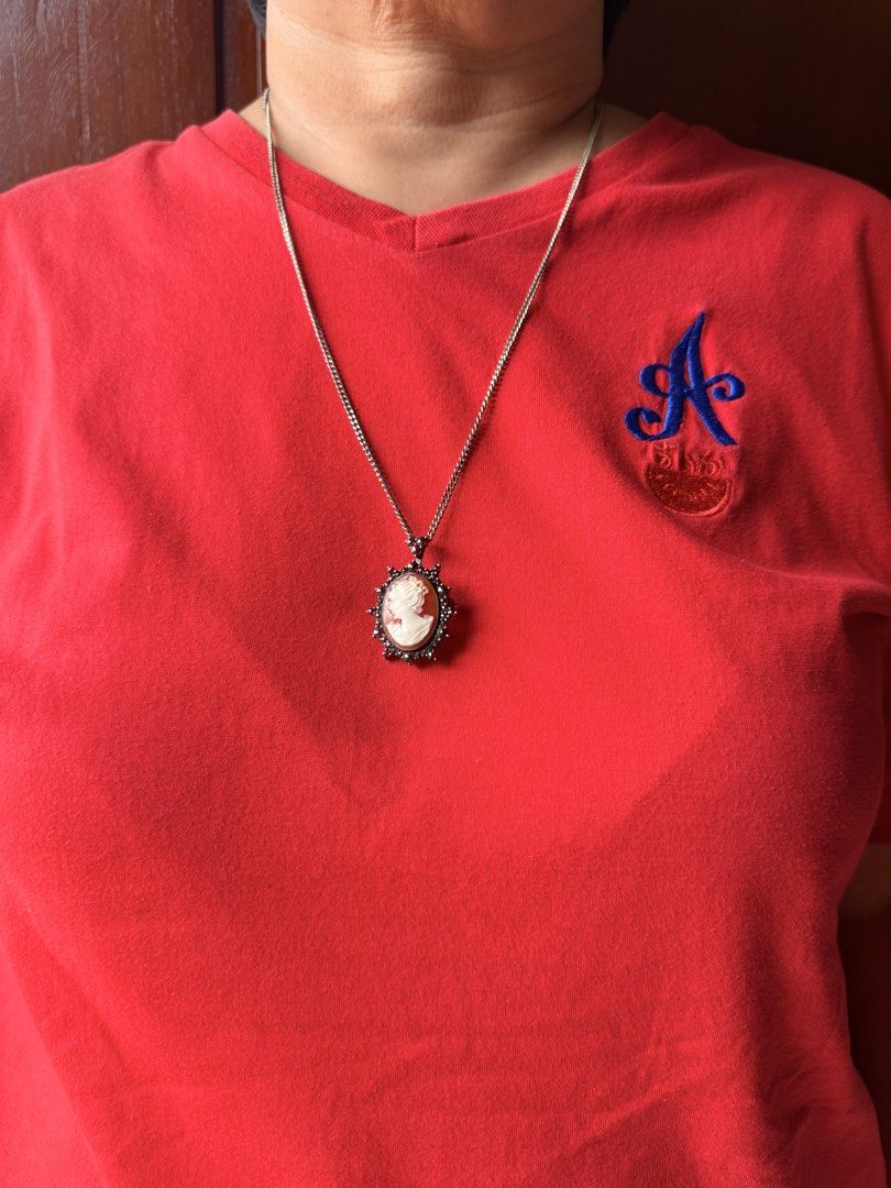 Vintage Cameo Pendant Necklace (Category: Necklaces) located in Manila. Submitted by santabhe (Listing ID 1423083029, Image 3). Description: FOR SALE: Mom’s Vintage Cameo Necklace 🐚✨ Price: ₱3,000 Condition: Pre-loved / Well-maintained Elegant and timeless piece from my mom’s personal collection. Perfect for vintage lovers! FEATURES: • Classic Design: Detailed carved silhouette (Cameo). • Accents: Surrounded by deep red stones (Victorian vibe). 