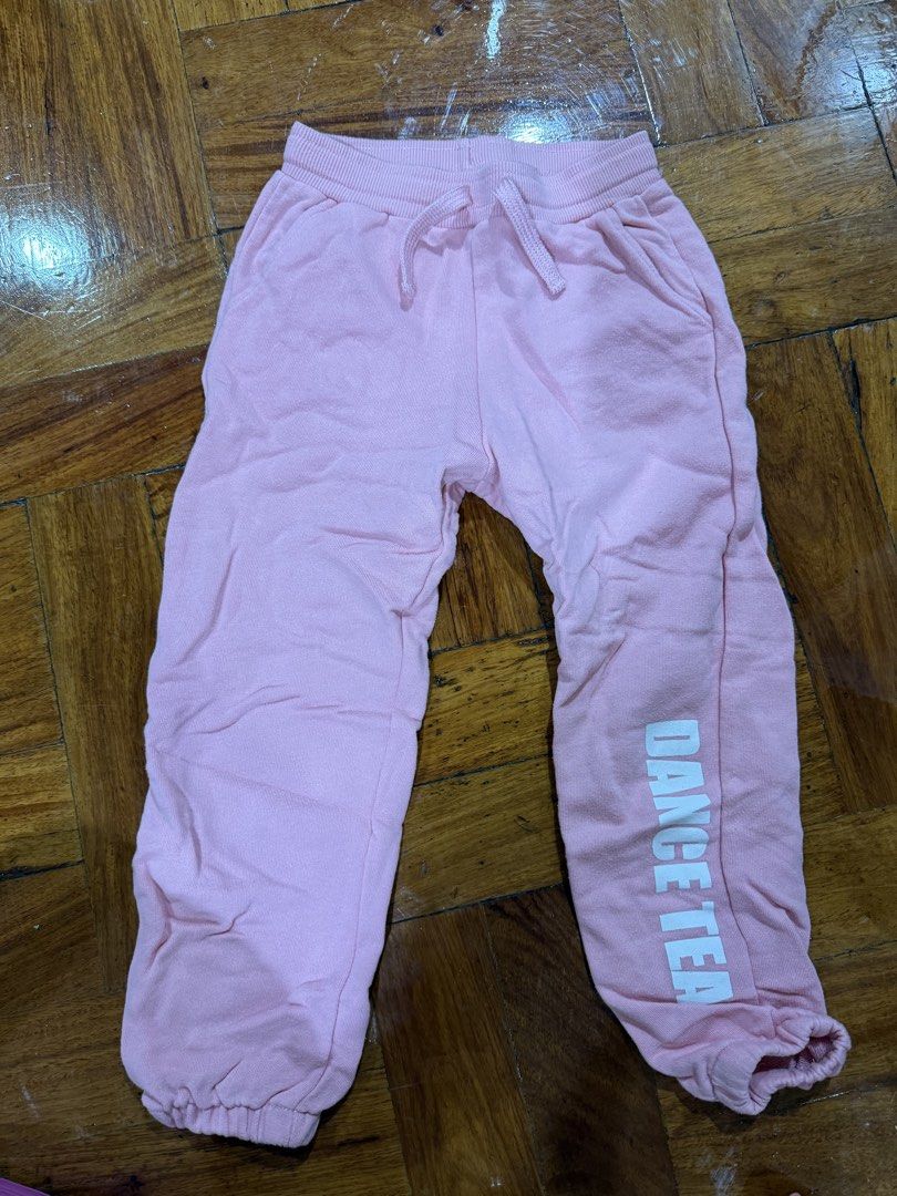 Zara Pink Sweatpants with Dance Text size 8 (Category: Babies & Kids Fashion) located in Caloocan City. Submitted by tang.930 (Listing ID 1423112922, Image 1). Description: - Pink Zara sweatpants - Size 8 - Features "DANCE" text on leg - Drawstring waist and elastic cuffs - Made in Morocco - Perfect for casual wear or dance practice - Comfortable and stylish.