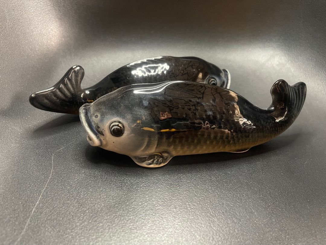 1950s Ceramic Fish Wall Pocket Vase | Vintage (Category: Other Home Decor) located in Quezon City. Submitted by reallyrealreal (Listing ID 1423318959, Image 2). Description: Original Price: 8000 Bought in the 1950s Dimensions in the photos SKQCET0049 - Vintage fish-shaped salt and pepper shakers - Glossy black finish with iridescent highlights - Detailed design featuring fins and open mouths - Each shaker has a hole on the bottom.