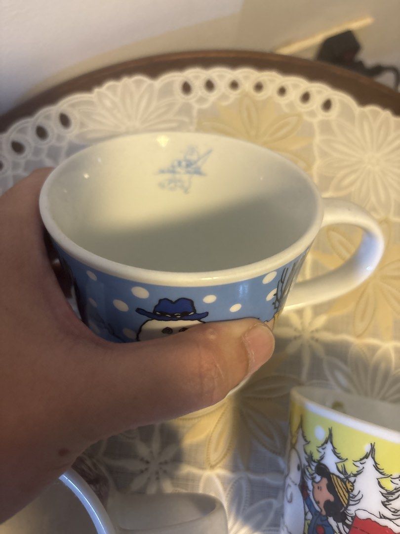 3 pcs: Snoopy x KFC Peanuts Christmas Mugs Set (Category: Coffee & Tea Tableware) located in Calamba. Submitted by cur8d (Listing ID 1423315468, Image 3). Description: - Set of three Peanuts Christmas mugs. - Each mug features a different Peanuts character (Snoopy, Charlie Brown, etc.) in a winter/Christmas scene. - Designs include snowmen, snow, and Christmas trees. - White interior and handle. - Made of ceramic..
