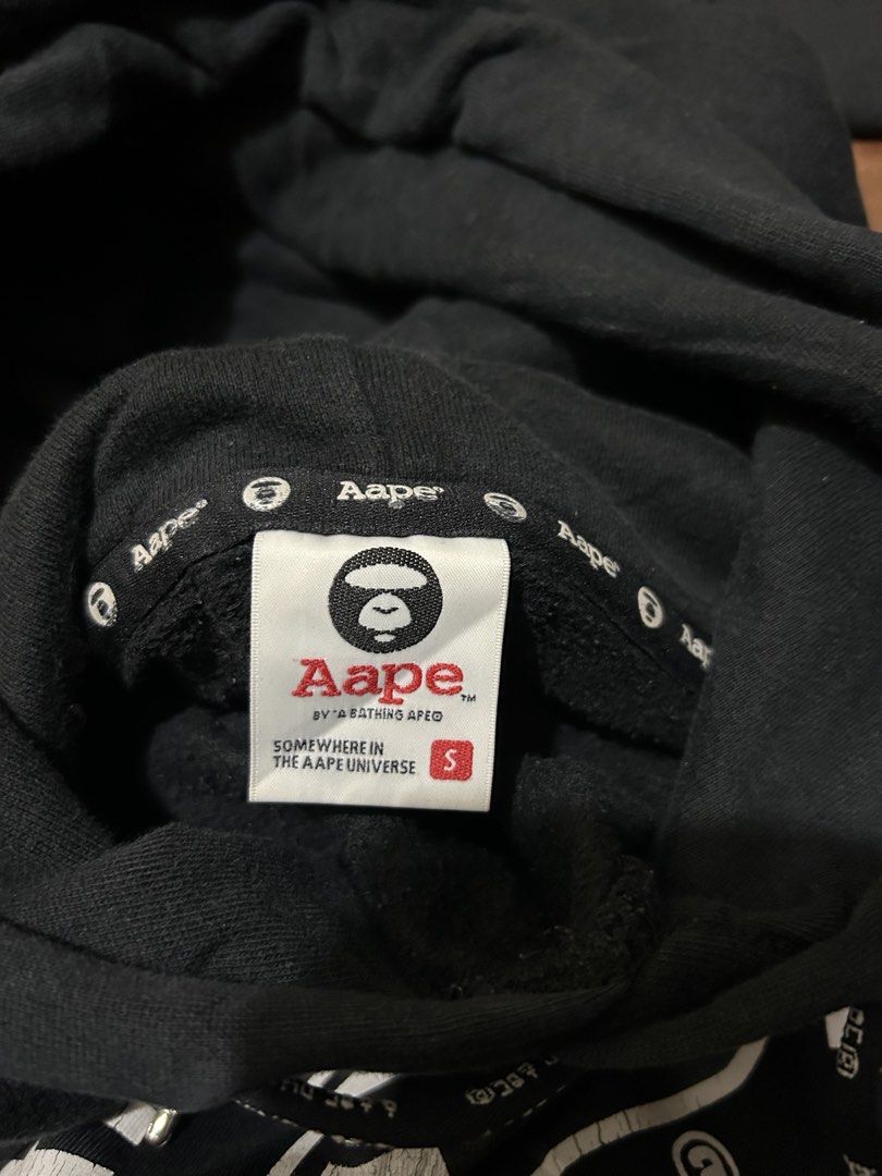 AAPE APUNVS Hoodie by A Bathing Ape (Category: Hoodies) located in Rosario. Submitted by thriftcorner_ph (Listing ID 1423388920, Image 2). Description: Dimes: 21x24 Color Rate: 9/10 Condition: Very Good Complete tags Issue: Hairline cracks on the front print Overall still wearable and presentable No holes/No major stains.