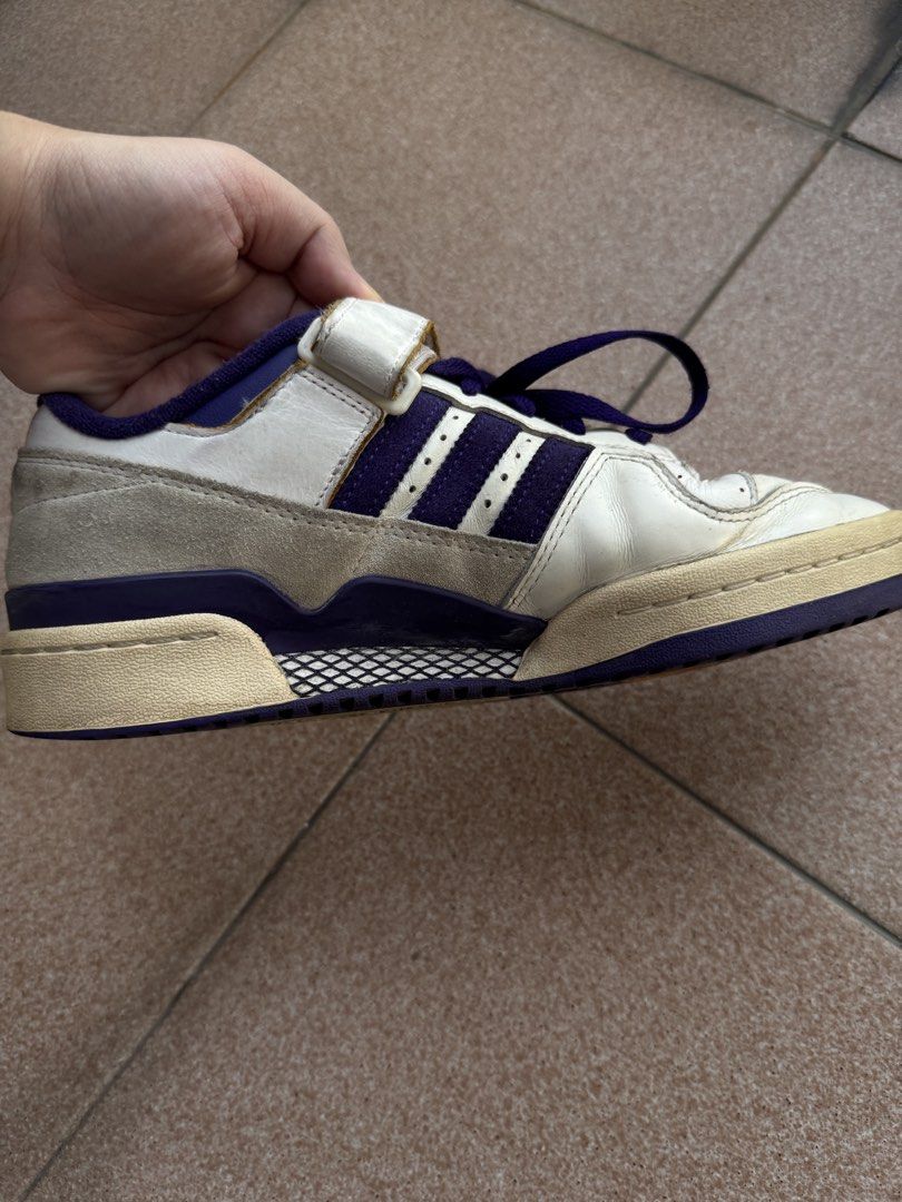 Adidas Forum 84 Low Off White/Core Purple (Category: Sneakers) located in Makati City. Submitted by flypar (Listing ID 1423388209, Image 3). Description: - Colorway: Off White/Core Purple - Size: EU 42 / UK 8 / US 9 - Features the iconic Forum design with strap and stripes - Condition: Good, with a vintage look - Meetup Locations: Glorietta and Greenbelt 5 (Makati).