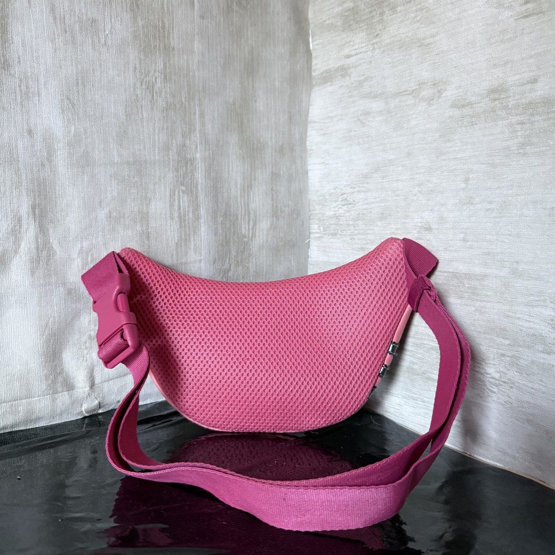 Adidas Pink Waist Bag (Category: Cross-body Bags) located in Dagupan City. Submitted by hangoverph (Listing ID 1423315168, Image 2). Description: - Pink Adidas waist bag - Iconic three stripes design - Main compartment with zipper closure - Adjustable strap - Adidas logo on the front - Lined with matching pink fabric - Ideal for carrying essentials - Used few times - Brand: Adidas - RFS: decluttering.