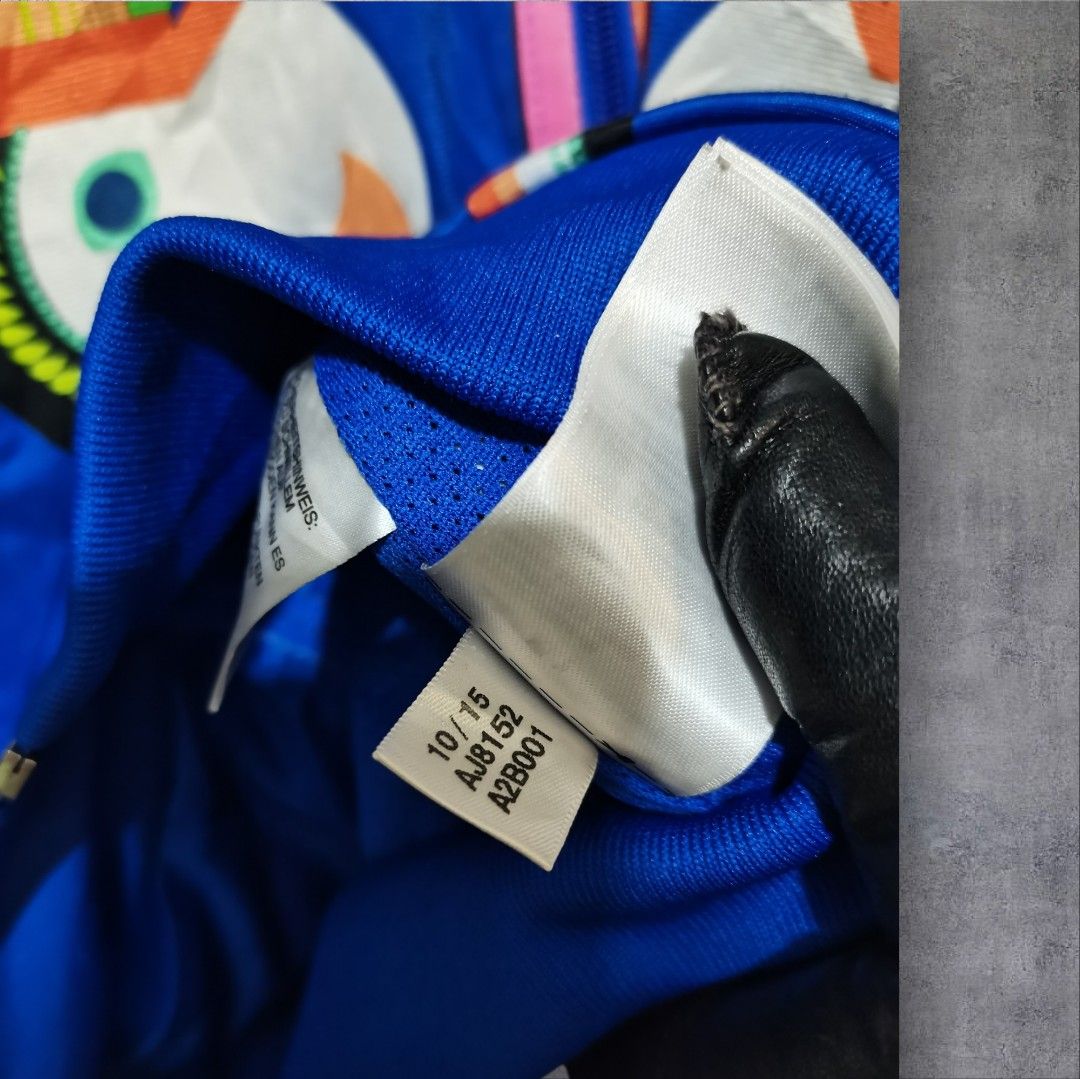 Adidas Supergirl Toucan Jacket (Category: Coats, Jackets and Outerwear) located in Manila. Submitted by eagerbeaverph (Listing ID 1423382152, Image 3). Description: Adidas x supergirl farm rio track jacket rare L 24.5 W 18 Adidas Originals Supergirl Farm Rio Track Jacket. Collaboration: FARM Rio (The FARM Company) Design: Twin toucan bird design inspired by Tijuca Island, featuring a baseball-style collar and rubber-print Trefoil logo .