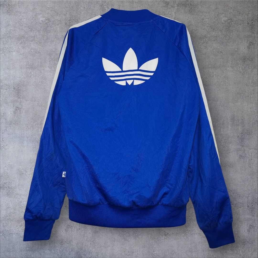 Adidas Supergirl Toucan Jacket (Category: Coats, Jackets and Outerwear) located in Manila. Submitted by eagerbeaverph (Listing ID 1423382152, Image 2). Description: Adidas x supergirl farm rio track jacket rare L 24.5 W 18 Adidas Originals Supergirl Farm Rio Track Jacket. Collaboration: FARM Rio (The FARM Company) Design: Twin toucan bird design inspired by Tijuca Island, featuring a baseball-style collar and rubber-print Trefoil logo .