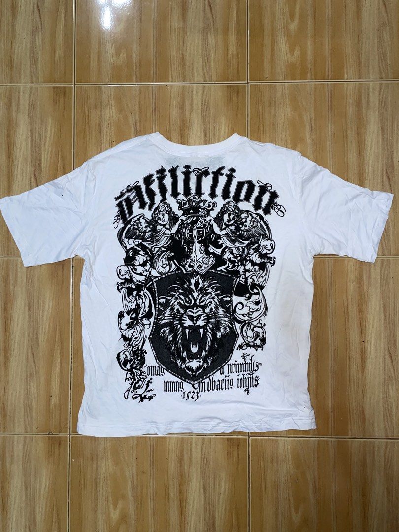 Affliction Lion Graphic T-shirt (Category: Tshirts & Polo Shirts ) located in Manila. Submitted by earlonashow (Listing ID 1423335374, Image 3). Description: issue: need wash 22x26.