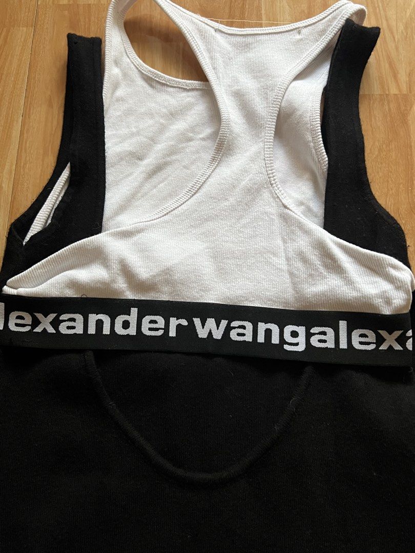 Alexander Wang Sleeveless Dress (Category: Dresses) located in Caloocan City. Submitted by wildfox-48eb (Listing ID 1423344068, Image 3). Description: - Alexander Wang sleeveless dress - Features a black body with a white racerback top - Brand name detail on waistband - Size: L - Material: 100% polyester, 100% cotton.
