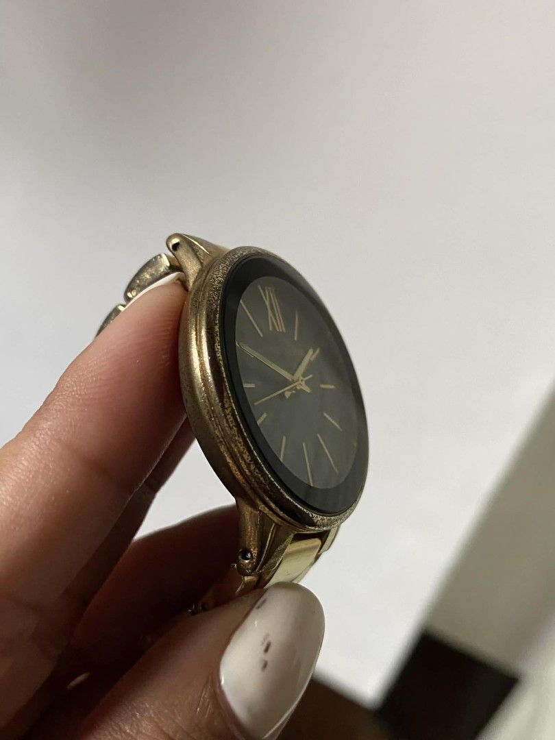 Anne Klein Gold Watch 37mm (Category: Women's Watches) located in Makati City. Submitted by legittttt (Listing ID 1423346617, Image 3). Description: - Anne Klein watch - Gold-tone bracelet and case -Black dial with gold-tone hands and markers - Stainless steel back - Water resistant to 100ft - Comes with original box Original working with battery.