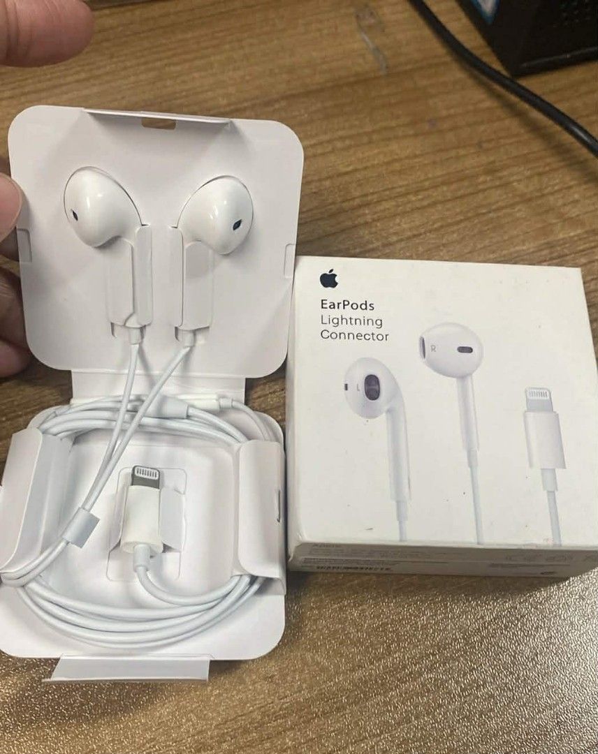 Apple EarPods with Lightning Connector (Category: Earphones) located in Manila. Submitted by milasgadgetph (Listing ID 1423261867, Image 1). Description: - EarPods with Lightning Connector - Comes with original box - White earphones - Unused condition - Apple logo and product name visible on the box - Lightning connector included.