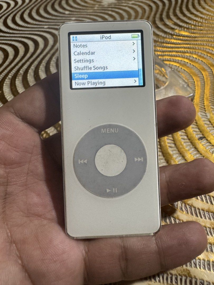 Apple iPod nano 1st generation 2GB (Category: Portable Music Players) located in Quezon City. Submitted by angace13 (Listing ID 1423372284, Image 1). Description: selling my ipod nano 1st gen 2gb no issue ready to use battery still good with case with charger with songs already walang sakit sa ulo fast sync pm nlng sa interested ty.