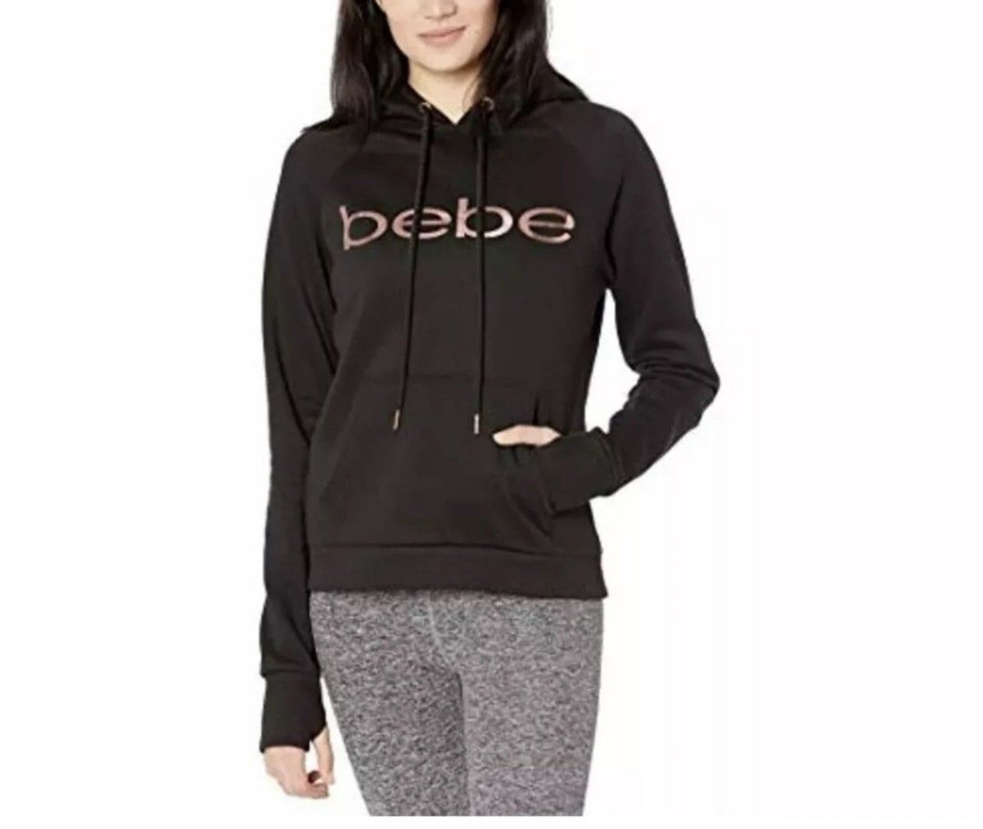 Bebe Sport Hoodie 2X (Category: Coats, Jackets and Outerwear) located in Cebu City. Submitted by lesthrift (Listing ID 1423321975, Image 2). Description: - Bebe Sport hoodie - Size: 2X - Features a sequined brand logo - Drawstring hood - Front pocket - Material: Cotton/Polyester blend - Long sleeves - Comfortable fit.
