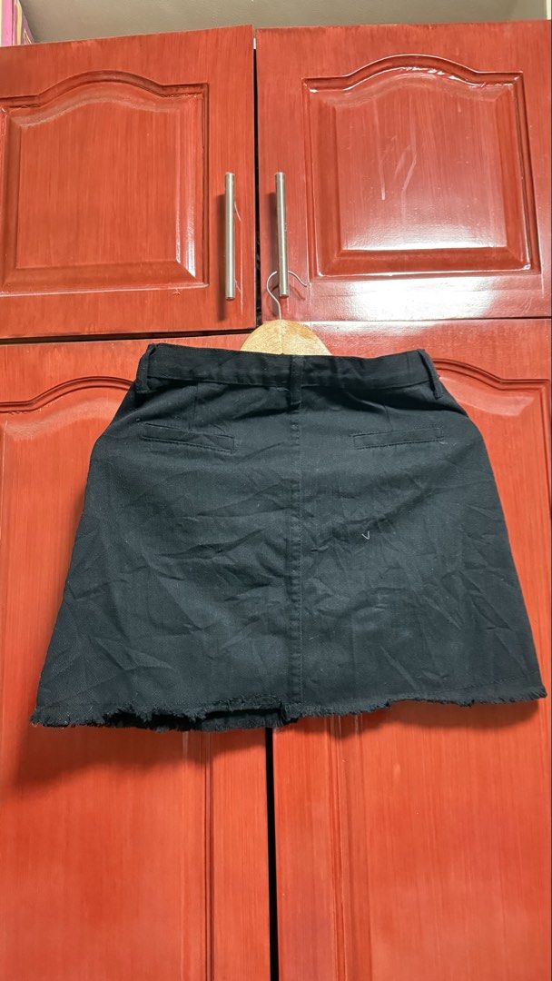 Black Denim Skirt with Button Detail (Category: Skirts) located in Amadeo. Submitted by beaflr (Listing ID 1423406806, Image 2). Description: Size 26-27.