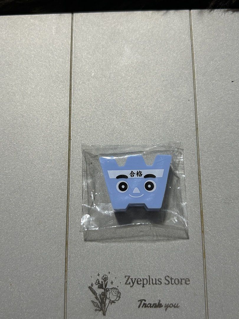 Blue Eraser with Chinese Characters (Category: Stationery & School Supplies) located in Angeles City. Submitted by zyeplus (Listing ID 1423312803, Image 1). Description: - Adorable blue eraser - Features a unique face and Chinese characters design - Still in original packaging - Ideal for students and collectors - Functional and collectible.