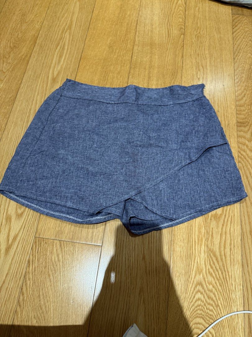 Blue Skort Shorts Made in Thailand (Category: Shorts) located in Paranaque City. Submitted by itstaehyungscart (Listing ID 1423404666, Image 1). Description: - Blue skort shorts - Wrap-style front - Elastic waistband - Lightweight fabric - Solid blue color - Made in Thailand - Ideal for warm weather.