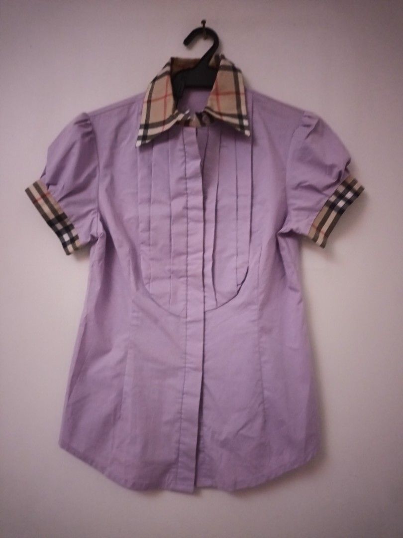 Burberry Brit Shirt (purple) (Category: Tshirts & Polo Shirts ) located in Quezon City. Submitted by cncarousel (Listing ID 1423339850, Image 1). Description: - Authentic Burberry Brit shirt - Size: M - Color: Light Purple - Features classic check pattern on collar and cuffs - Button-down design - Includes original tags.