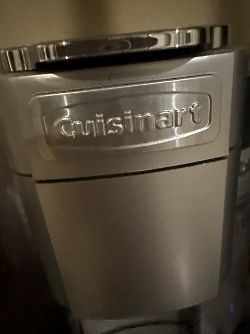 Cuisinart Single-Serve Coffee Maker (Category: Coffee Machines & Makers) located in Talisay. Submitted by secondsbyvan (Listing ID 1423382879, Image 2). Description: - Cuisinart single-serve coffee maker - Features a digital display - Easy-to-use menu and brew buttons - Includes water reservoir - Drip tray included - Compatible with coffee pods - In good working condition.