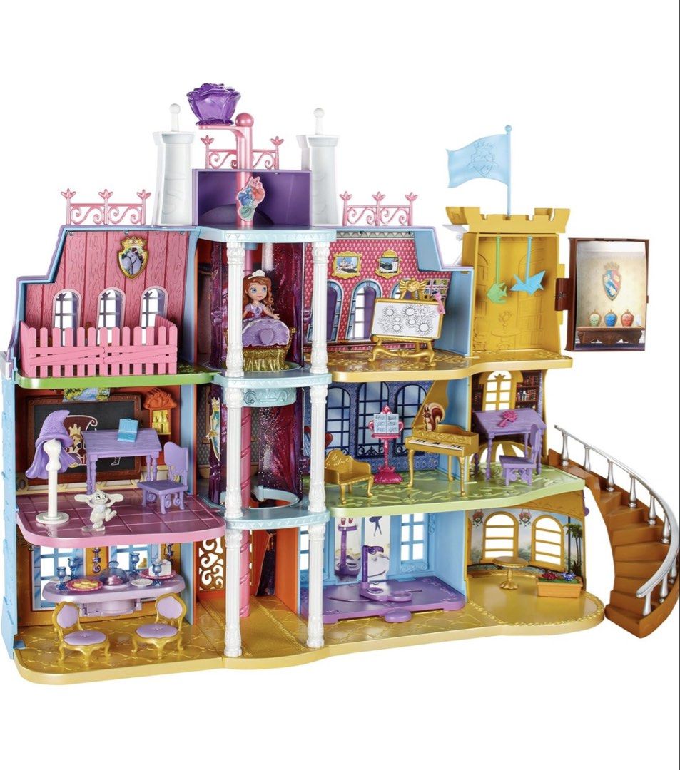 Disney Sofia the First Royal Prep Castle (Category: Kids Toys) located in Talisay. Submitted by secondsbyvan (Listing ID 1423400987, Image 1). Description: Disney Sofia the First Royal Prep Castle playset. It includes a Sofia doll and various accessories like furniture, a piano, and food items. The castle has multiple levels and rooms for play. It features a clock tower and a spiral staircase. almost complete small items including Sofia moving el
