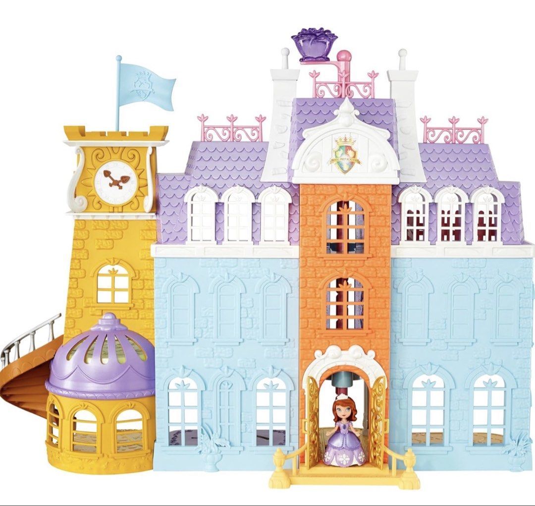 Disney Sofia the First Royal Prep Castle (Category: Kids Toys) located in Talisay. Submitted by secondsbyvan (Listing ID 1423400987, Image 2). Description: Disney Sofia the First Royal Prep Castle playset. It includes a Sofia doll and various accessories like furniture, a piano, and food items. The castle has multiple levels and rooms for play. It features a clock tower and a spiral staircase. almost complete small items including Sofia moving el