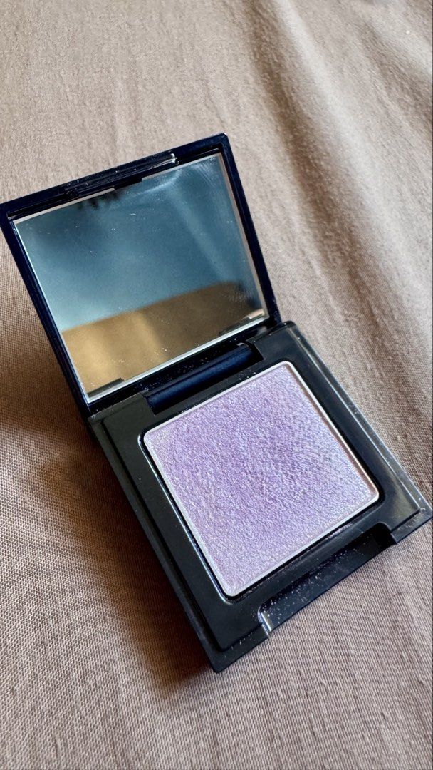 Elegance Razzle Star Eye Color 62 (Category: Makeup) located in Las Pinas. Submitted by jenlagura0215 (Listing ID 1423331029, Image 2). Description: - Elegance Razzle Star Eye Color 62 eyeshadow - Light purple color with metallic glitter sparkle - Comes in a sleek black compact with a mirror - Made in Japan - Contains 2.0g of product.