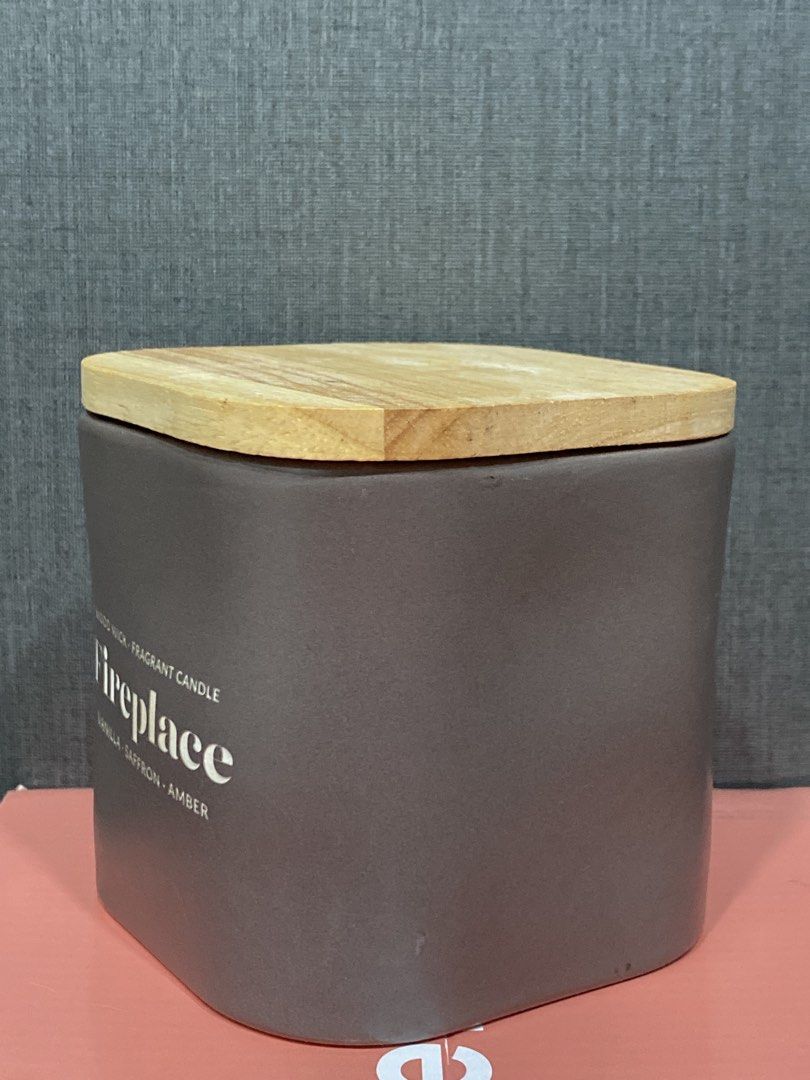Fireplace Scented Candle with Wooden Lid (Category: Home Fragrance) located in Taguig. Submitted by cosmickindle (Listing ID 1423373813, Image 2). Description: •Scented candle with a wood wick •Fragrance: Vanilla, saffron, and amber •Comes in a gray ceramic container •Includes a wooden lid •Creates a cozy atmosphere •For home decor or bathroom scented candle •Slightly negotiable •RFS: Decluttering **First to pay gets it** **Please manage your exp