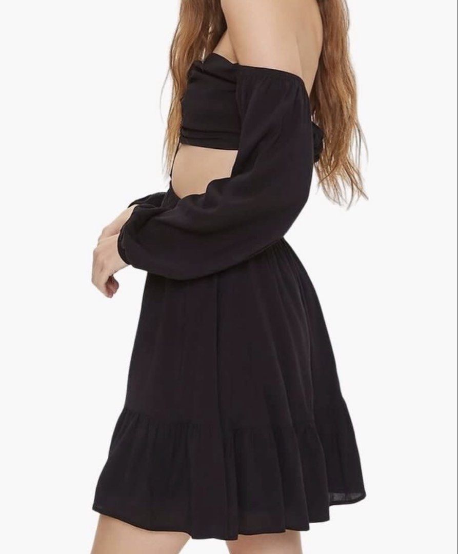 Forever 21 Black Cutout Dress BNWT (Category: Dresses) located in San Juan City. Submitted by decluttzi (Listing ID 1423262807, Image 3). Description: - Black long-sleeved dress - Cutout design - Off-shoulder neckline with halter tie - Flowy skirt with ruffled hem - Cutout back - Ideal for night outs and special events.