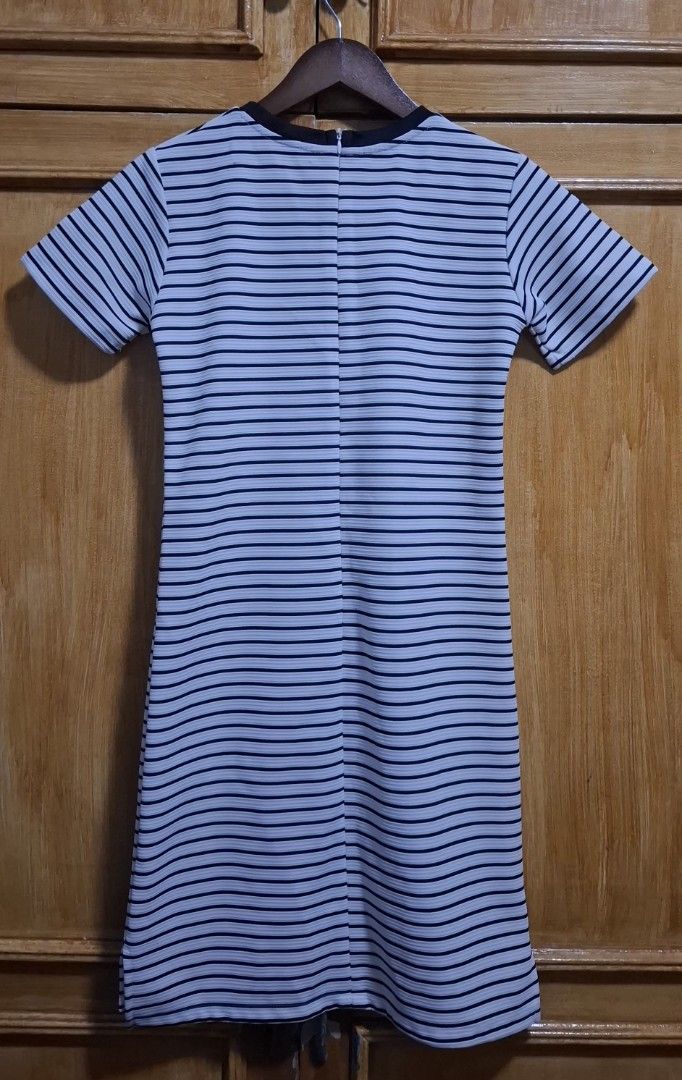 Forme Striped Dress (Category: Dresses) located in Quezon City. Submitted by MP_Declutters (Listing ID 1423381643, Image 2). Description: - Black and white striped dress - Short sleeves - Round neckline with black trim - Made in the Philippines - Size: XS - Features a back zipper Prices are negotiable — send your offer!.