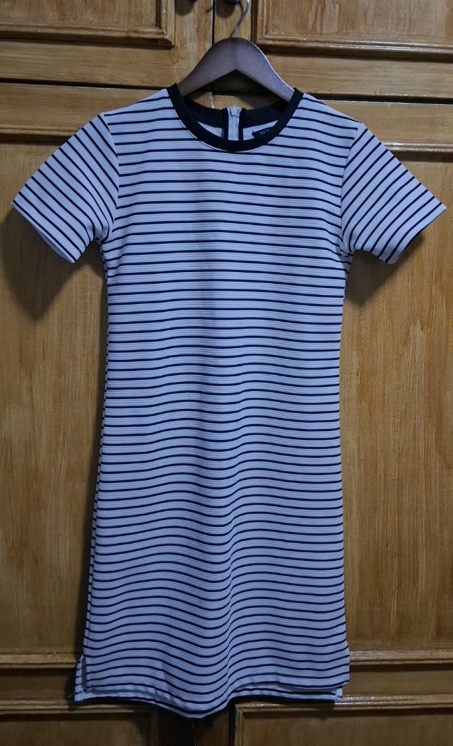 Forme Striped Dress (Category: Dresses) located in Quezon City. Submitted by MP_Declutters (Listing ID 1423381643, Image 1). Description: - Black and white striped dress - Short sleeves - Round neckline with black trim - Made in the Philippines - Size: XS - Features a back zipper Prices are negotiable — send your offer!.