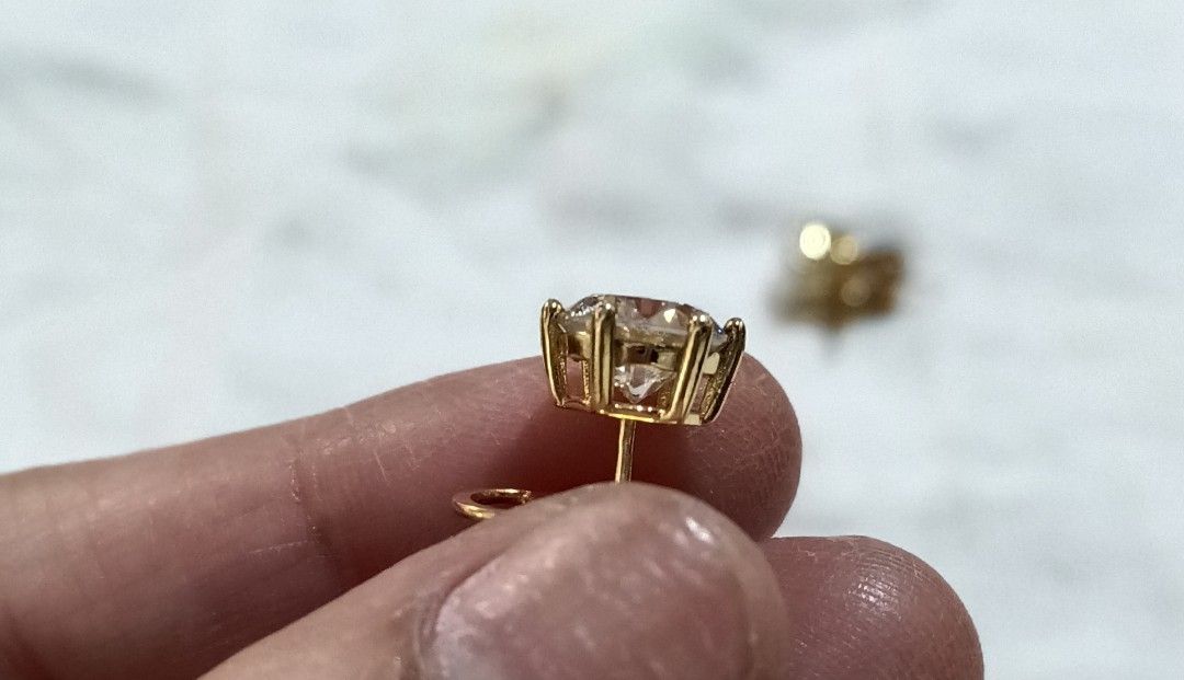 Earrings with Moissanite Stones (Category: Earrings) located in Bulacan. Submitted by andiela (Listing ID 1423265081, Image 3). Description: - Yellow Gold stud earrings - Silver 925 setting in yellow gold vermeil - Clear, sparkling moissanite stones - 2.5 ct each stone total of 5ct - Classic design - Secure post backing - Suitable for everyday wear or special occasions - Adds a touch of sparkle.