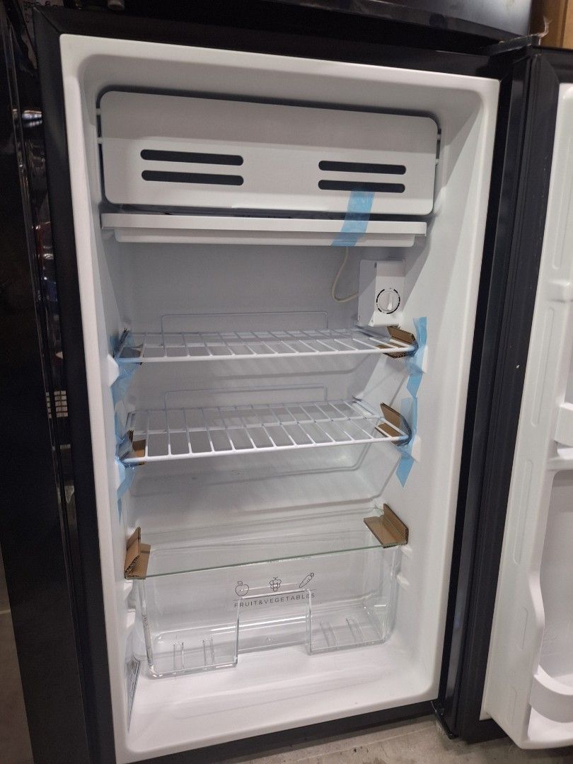 Harbour 93L Bar Fridge / Refrigerator (Category: Refrigerators and Freezers) located in Muntinlupa City. Submitted by shopandsaveau (Listing ID 1423334352, Image 3). Description: Harbour bar fridge has a 93L volume. It features an energy rating label. The interior includes shelves and compartments for organized storage. It is a compact size, perfect for small spaces. Surplus from Australia.