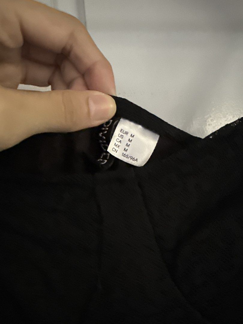 H&M Black Spaghetti Strap Dress - Size M (Category: Dresses) located in Cavite. Submitted by cc.bagvault (Listing ID 1423319217, Image 2). Description: - H&M black spaghetti strap dress - Size: M - Features a fitted silhouette - Delicate lace trim at the hem - Scoop neckline - Adjustable straps - Ideal for special occasions - RFS: decluttering - no issue (used once lang).