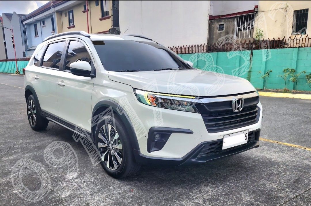 Honda BR-V (Category: Used Cars) located in San Mateo. Submitted by drahcirat63078 (Listing ID 1423310563, Image 2). Description: CAR FOR SALE HONDA BR-V 👉 CAR DETAILS: ● Honda BRV "S" Variant ● Automatic CVT ● 7 Seater ● Year model 2023 ● All stock ● Coding: Wednesday (plate ending 6) ● CASA maintained ● 61k odometer reading (lady driver) ● w/ existing dashcam back and front (QCY brand) ● medium tint (3M brand) ● w/ 2 remote keys (newly replace