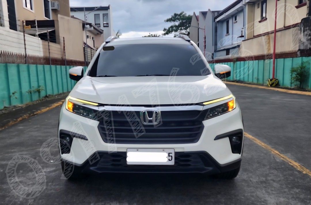 Honda BR-V (Category: Used Cars) located in San Mateo. Submitted by drahcirat63078 (Listing ID 1423310563, Image 1). Description: CAR FOR SALE HONDA BR-V 👉 CAR DETAILS: ● Honda BRV "S" Variant ● Automatic CVT ● 7 Seater ● Year model 2023 ● All stock ● Coding: Wednesday (plate ending 6) ● CASA maintained ● 61k odometer reading (lady driver) ● w/ existing dashcam back and front (QCY brand) ● medium tint (3M brand) ● w/ 2 remote keys (newly replace