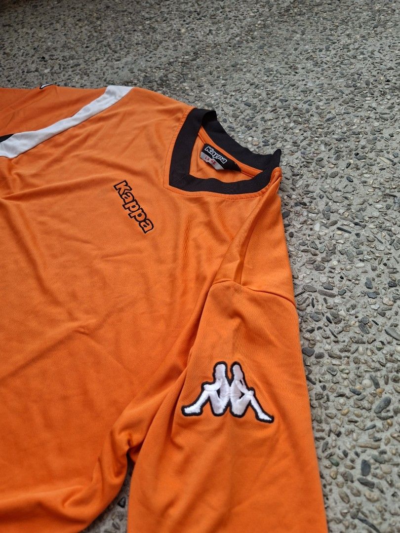 Kappa Orange V-Neck T-Shirt (Category: Tshirts & Polo Shirts ) located in Marikina City. Submitted by 2nd_chancedrips (Listing ID 1423378834, Image 3). Description: - Orange Kappa V-neck T-shirt - Kappa logo on chest and sleeves - 19 x 26.5 - Black and white accents on sides and sleeves - Made in Thailand - Size: FT#SR.