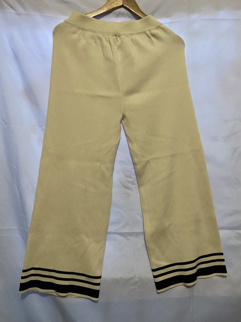 Knitted Cream Coordinates (Category: Sets or Coordinates) located in Caloocan City. Submitted by declutterbycha (Listing ID 1423420803, Image 2). Description: - Cream-colored coordinates set - Includes a short-sleeved top and wide-leg pants - Top features black stripes on the sleeves - Pants have black stripes at the hem - Made of knit material - Top has a crew neck - worn once 💰MODE OF PAYMENT: Uniobank, Maribank, Gotyme, Gcash 📦MODE OF DELIVE