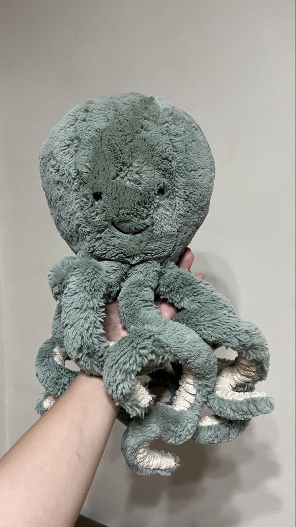 Large Jellycat Octopus Stuffed Toy (Category: Plushies & Soft Toys) located in Quezon City. Submitted by jellycooties (Listing ID 1423358265, Image 1). Description: - Jellycat octopus plush toy - Soft and plush exterior - Detailed tentacles with unique textured underside - Embroidered eyes and stitched smile - Ideal for cuddling or decoration.