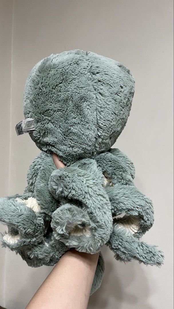 Large Jellycat Octopus Stuffed Toy (Category: Plushies & Soft Toys) located in Quezon City. Submitted by jellycooties (Listing ID 1423358265, Image 2). Description: - Jellycat octopus plush toy - Soft and plush exterior - Detailed tentacles with unique textured underside - Embroidered eyes and stitched smile - Ideal for cuddling or decoration.