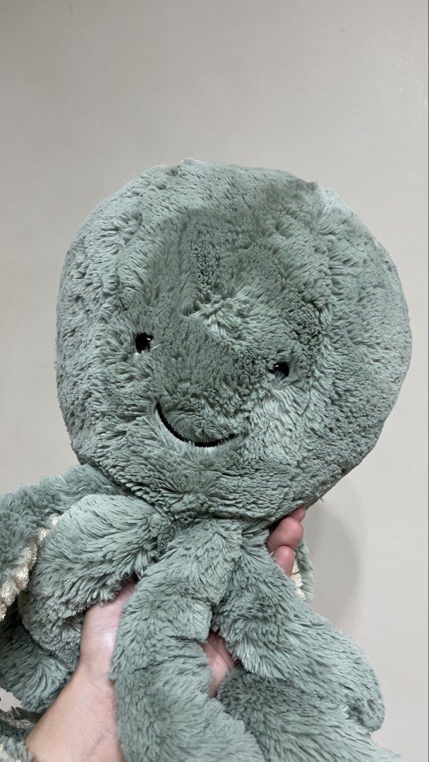 Large Jellycat Octopus Stuffed Toy (Category: Plushies & Soft Toys) located in Quezon City. Submitted by jellycooties (Listing ID 1423358265, Image 3). Description: - Jellycat octopus plush toy - Soft and plush exterior - Detailed tentacles with unique textured underside - Embroidered eyes and stitched smile - Ideal for cuddling or decoration.