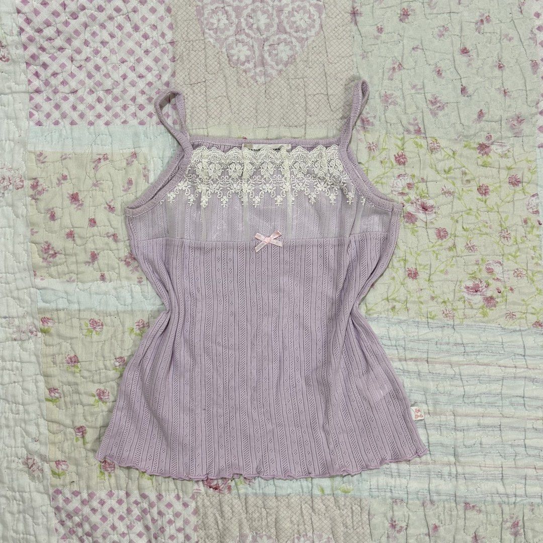 Lavender Pointelle Lace Trim Camisole/inner (Category: Sleeveless) located in Marikina City. Submitted by naiomeww (Listing ID 1423321602, Image 1). Description: 🌷 ideal for petite women - Size: XXS-XS - Pointelle fabric - Delicate lace trim - Adorable pink bow detail - Ribbed knit body - Thin straps - Lightweight fabric - Brand tag visible * dm for ww’s.