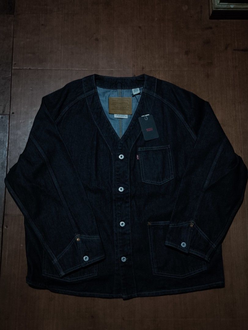 Levi's Engineer Cardigan Jacket (Category: Coats, Jackets and Outerwear) located in Dapitan. Submitted by roxfranz714 (Listing ID 1423310855, Image 1). Description: - Levi's denim jacket - Dark wash - Button-up front - Two front pockets - Classic design - Collarless neckline - Buttoned cuffs - Versatile for various outfits Fit to XL.