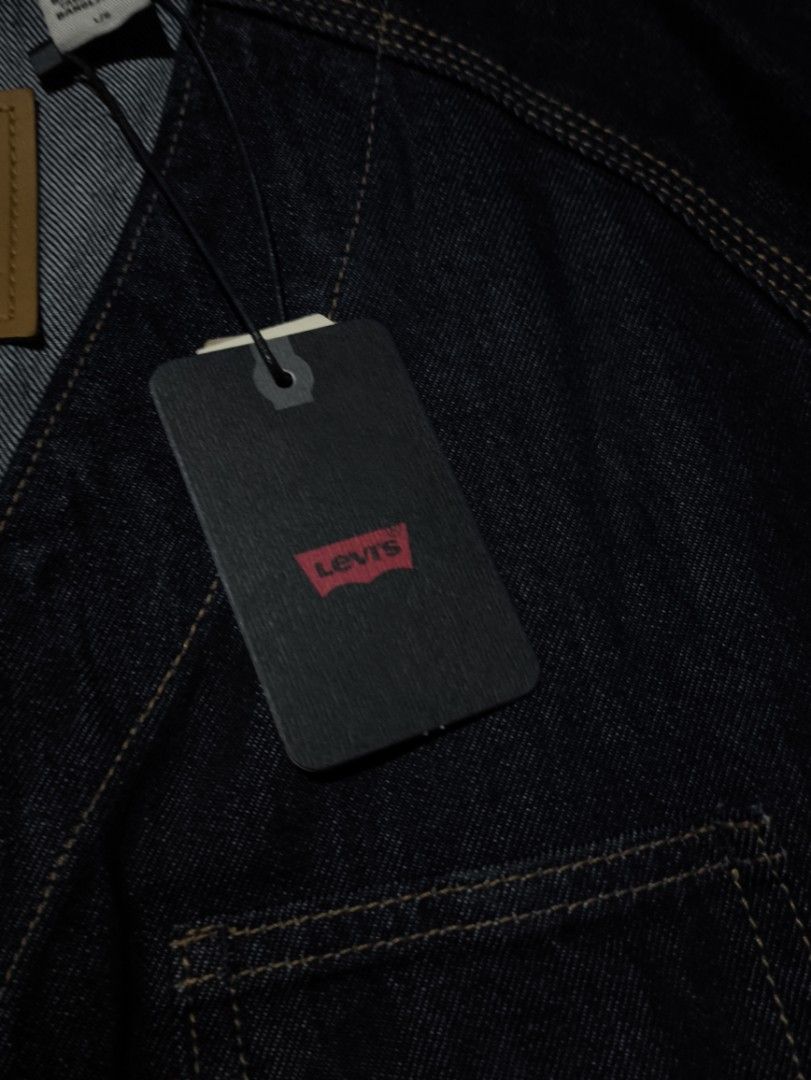 Levi's Engineer Cardigan Jacket (Category: Coats, Jackets and Outerwear) located in Dapitan. Submitted by roxfranz714 (Listing ID 1423310855, Image 2). Description: - Levi's denim jacket - Dark wash - Button-up front - Two front pockets - Classic design - Collarless neckline - Buttoned cuffs - Versatile for various outfits Fit to XL.