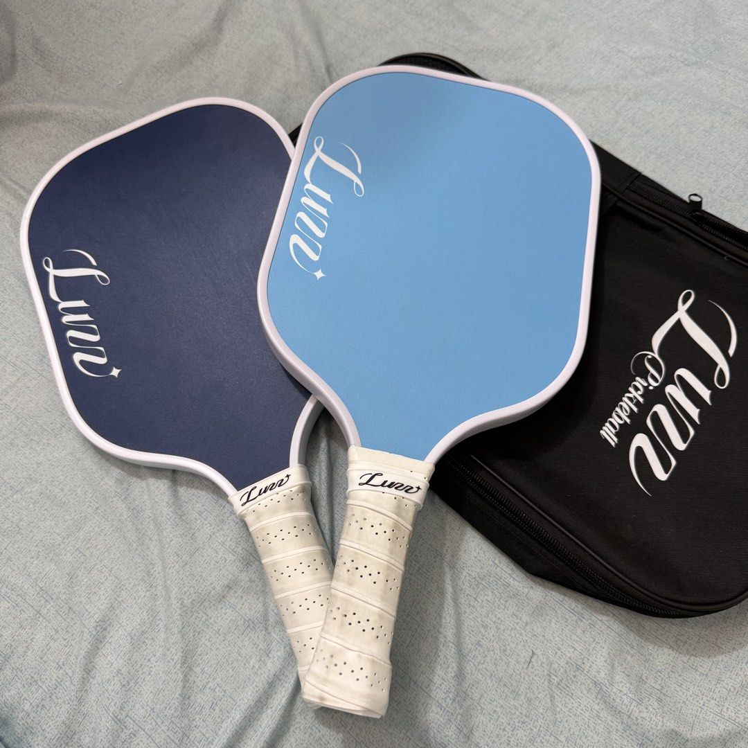 Luz Pickleball Paddle (SOLD AS SET) 2 pcs (Category: Racket and Ball Sports) located in Manila. Submitted by nikkipascu43203 (Listing ID 1423386736, Image 2). Description: Used only once. Practically brand new. Complete set: • 2 LUZZ paddles • Carry bag included RFS: Upgraded to a new paddle. Yung blue lang nagamit sa OP. Yung pink once lang nagamit. Perfect for beginners or casual players who want a quality starter set without paying full mall p